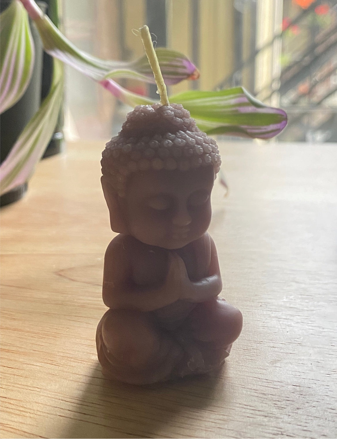 Praying Buddha candle