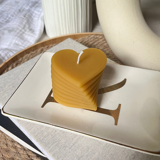 Curved heart candle