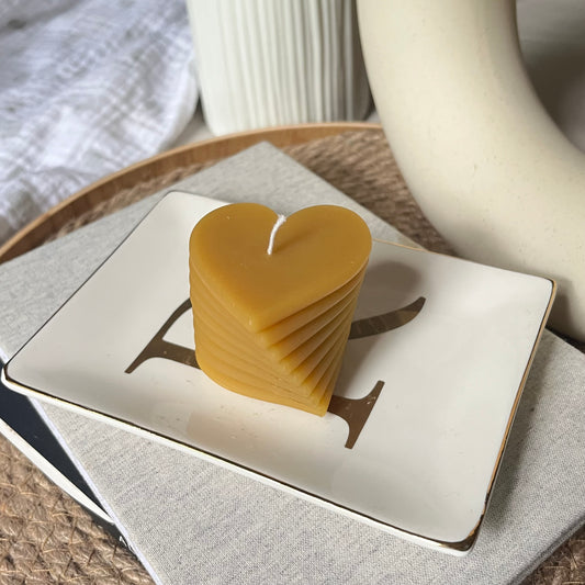 Curved heart candle