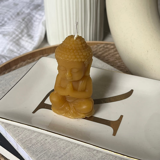 Praying Buddha candle