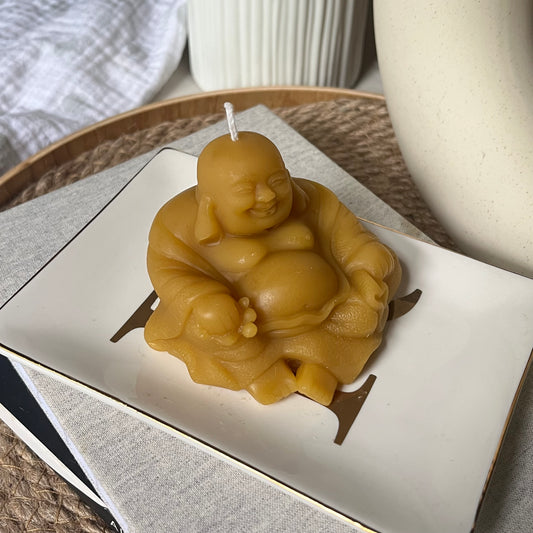 Laughing Buddha candle